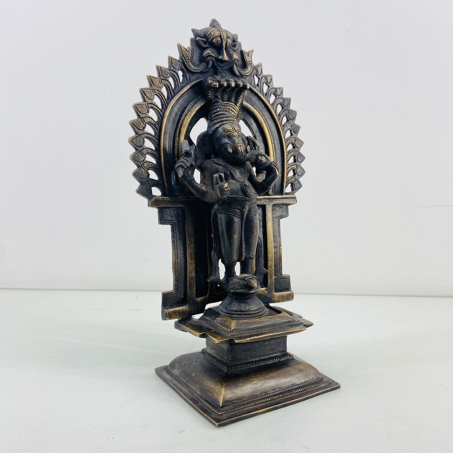 Brass standing Ganesha with detachable Prabhavali