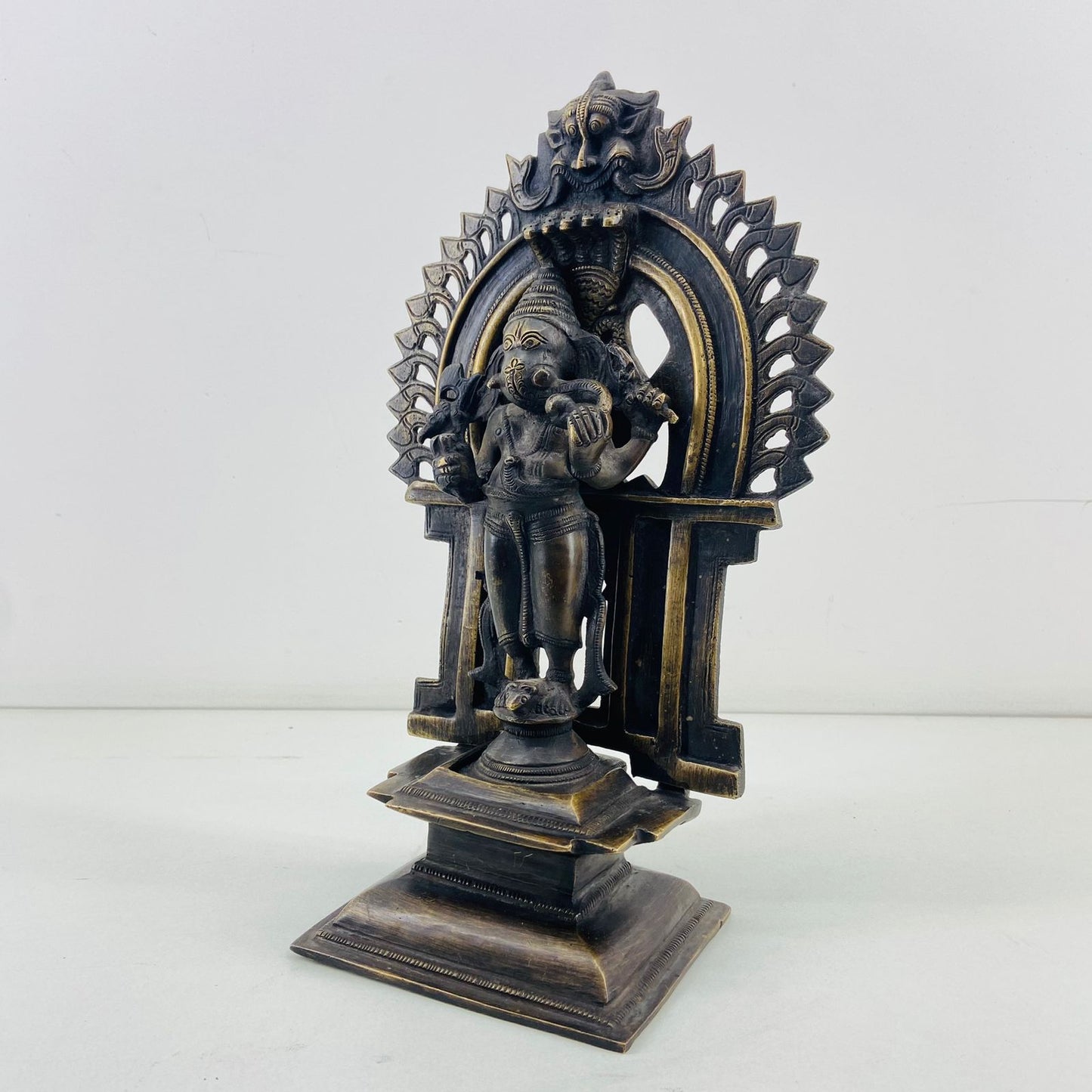 Brass standing Ganesha with detachable Prabhavali