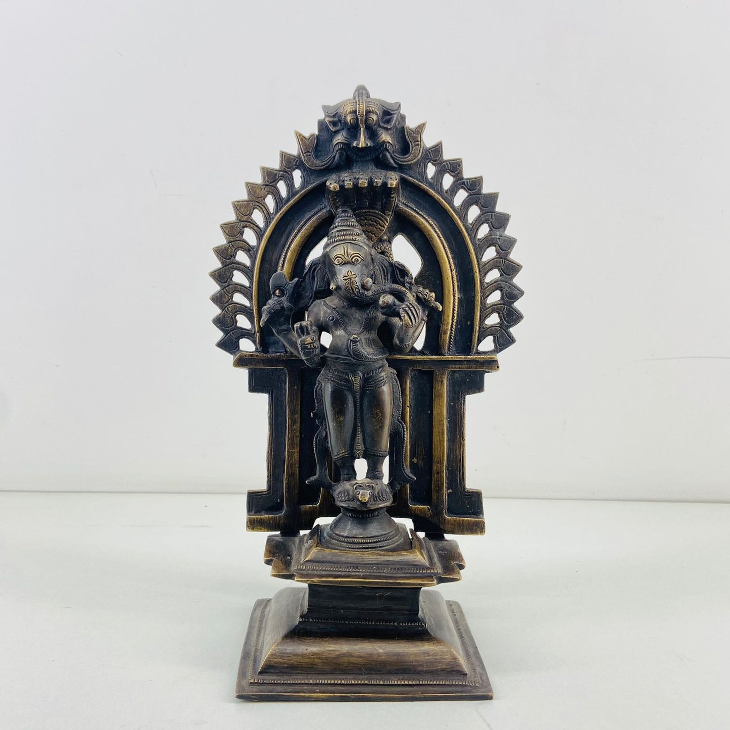 Brass standing Ganesha with detachable Prabhavali